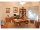 Home office with built-in bookshelves and a large desk at 108 Lake Region N Blvd, Winter Haven, FL 33881