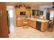 Eat-in kitchen with corner sink and ample storage at 108 Lake Region N Blvd, Winter Haven, FL 33881