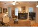 Living room features a fireplace and large windows at 108 Lake Region N Blvd, Winter Haven, FL 33881
