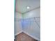 Walk in closet with wire shelving and neutral carpet at 1564 Leamington Ln, Winter Haven, FL 33884