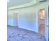 Bright bedroom with access to a full bathroom and ample closet space at 1564 Leamington Ln, Winter Haven, FL 33884