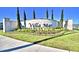Villa Mar community entrance with lush landscaping at 1564 Leamington Ln, Winter Haven, FL 33884