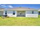 Spacious backyard with covered patio at 1564 Leamington Ln, Winter Haven, FL 33884