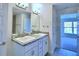 Double sink bathroom vanity with granite countertop at 1564 Leamington Ln, Winter Haven, FL 33884