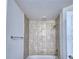 Simple bathroom with tile shower and bathtub at 1580 Leamington Ln, Winter Haven, FL 33884