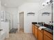 Bathroom with soaking tub and walk-in shower at 1849 Charleston Ln, Bartow, FL 33830