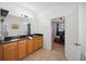 Bathroom with double vanity and a view of bedroom at 1849 Charleston Ln, Bartow, FL 33830