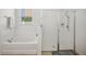 Clean bathroom with shower and tub at 1849 Charleston Ln, Bartow, FL 33830