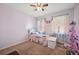 bedroom with twin bed and Christmas tree at 1849 Charleston Ln, Bartow, FL 33830