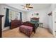 Cozy bedroom with a wooden bed frame and dresser at 1849 Charleston Ln, Bartow, FL 33830