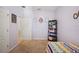bedroom with twin bed and bookshelf at 1849 Charleston Ln, Bartow, FL 33830