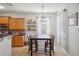 Kitchen dining area with a wooden table and four chairs at 1849 Charleston Ln, Bartow, FL 33830