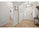Bright entryway with tile flooring and access to half bathroom at 1849 Charleston Ln, Bartow, FL 33830
