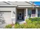 Front entrance with stone accents and a covered porch at 1849 Charleston Ln, Bartow, FL 33830