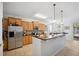 Spacious kitchen with stainless steel appliances and an island at 1849 Charleston Ln, Bartow, FL 33830