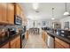 Spacious kitchen with an island and stainless steel appliances at 1849 Charleston Ln, Bartow, FL 33830
