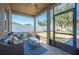 Relaxing screened porch with seating area, perfect for outdoor enjoyment at 1849 Charleston Ln, Bartow, FL 33830