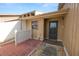Private condo patio with brick flooring and adjacent building view at 5225 Imperial Lakes Blvd # 22, Mulberry, FL 33860