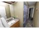 Bathroom with vanity, shower, and tiled floor at 5225 Imperial Lakes Blvd # 22, Mulberry, FL 33860