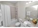 Bathroom with a bathtub, shower, and granite countertop at 6577 Great Bear Dr, Lakeland, FL 33805