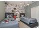 Mickey Mouse themed bedroom with twin beds at 7004 Oakwood St, Davenport, FL 33837