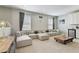 Large game room with sectional sofa and coffee table at 7004 Oakwood St, Davenport, FL 33837
