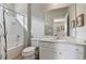Bathroom with a shower, toilet and vanity at 7004 Oakwood St, Davenport, FL 33837