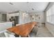 Open concept dining room with a view of the kitchen at 7004 Oakwood St, Davenport, FL 33837