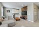 Game room with sectional sofa, media wall, and wet bar at 7004 Oakwood St, Davenport, FL 33837