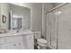 Clean bathroom with shower, toilet and vanity at 7004 Oakwood St, Davenport, FL 33837