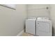 Convenient laundry room with washer and dryer at 7004 Oakwood St, Davenport, FL 33837