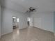 Bright bedroom with tile flooring and access to bathroom at 742 Sonja Cir, Davenport, FL 33897
