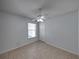 Spacious bedroom with tile floors and ceiling fan at 742 Sonja Cir, Davenport, FL 33897
