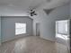 Spacious bedroom with tile flooring and ceiling fan at 742 Sonja Cir, Davenport, FL 33897