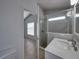Updated bathroom with a walk-in shower and new vanity at 742 Sonja Cir, Davenport, FL 33897