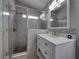 Modern bathroom with a walk-in shower and updated vanity at 742 Sonja Cir, Davenport, FL 33897