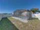 Enjoy the screened-in pool area, complete with a fenced yard at 742 Sonja Cir, Davenport, FL 33897