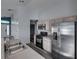 Modern kitchen with stainless steel appliances and light wood cabinets at 742 Sonja Cir, Davenport, FL 33897
