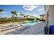 Inviting pool with lounge chairs and basketball hoop at 1005 Coyote Creek Way, Reunion, FL 34747