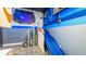 Star Wars themed bedroom with bunk beds, slide, and custom wall art at 1005 Coyote Creek Way, Reunion, FL 34747