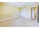 Empty bedroom with carpeted floor and double doors at 3484 Julius Estates Blvd, Winter Haven, FL 33881