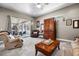 Spacious living room with comfy seating and sliding glass doors leading to a patio at 4510 Roundup Dr, Polk City, FL 33868