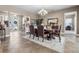Spacious dining area with hardwood floors and access to the entryway at 4510 Roundup Dr, Polk City, FL 33868