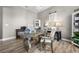 Bright home office with built-in shelving and a large wooden desk at 4510 Roundup Dr, Polk City, FL 33868
