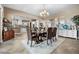 Bright dining room with views into the kitchen and backyard at 4510 Roundup Dr, Polk City, FL 33868