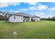 House exterior showcasing landscaping and driveway at 4510 Roundup Dr, Polk City, FL 33868
