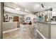 Open concept kitchen with views of living room and dining areas at 4510 Roundup Dr, Polk City, FL 33868