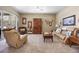 Bright living room featuring comfortable furniture and large windows at 4510 Roundup Dr, Polk City, FL 33868