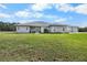 Ranch style home with attached garage and large yard at 4510 Roundup Dr, Polk City, FL 33868