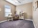 Cozy sitting area with comfy chair and built-in shelves at 4510 Roundup Dr, Polk City, FL 33868